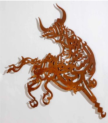 Calligraphic laser-cut metal relief sculpture by Khalil Chishtee, depicting a bull.
