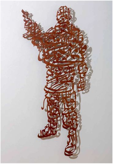 Calligraphic laser-cut metal relief sculpture by Khalil Chishtee, depicting a soldier with a gun.