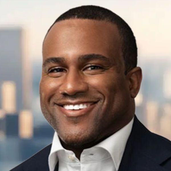 Smiling man in business attire.