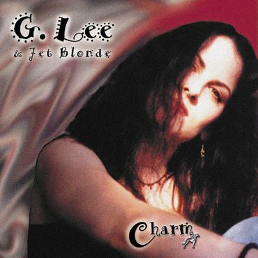Album cover featuring a woman with long dark hair and artistic text.