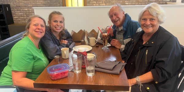 Three generations enjoying malts and shakes at The Malt Shop