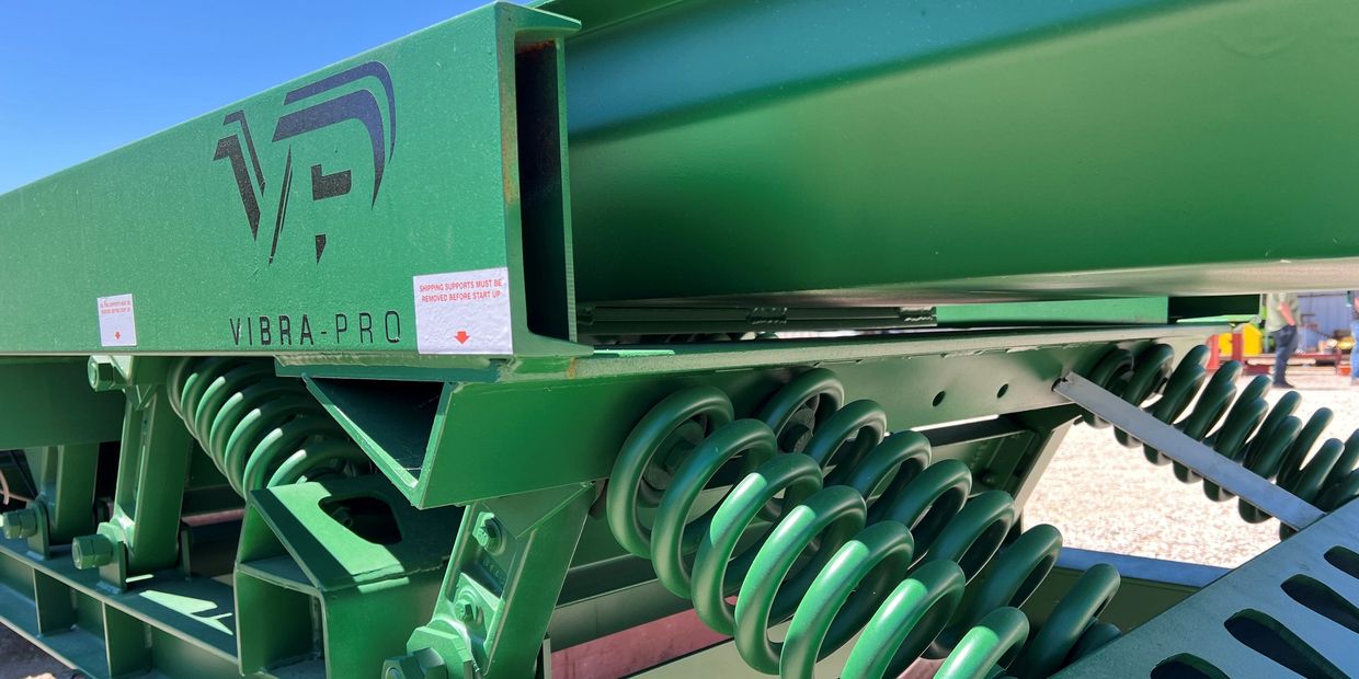Custom size feeder trough on vibratory conveyor.