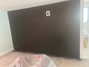 ship lap accent wall painted black