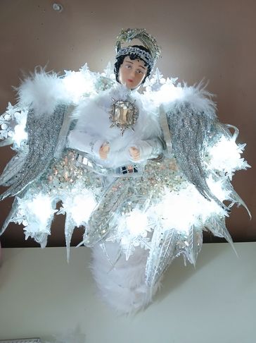 She is absolutely  stunning strong  her finished  touch is with beautiful  snow flake lights she com