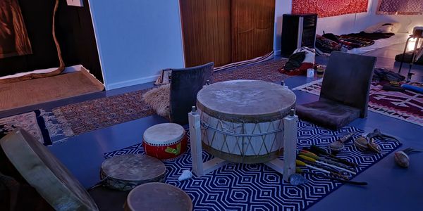 Drum circle, different types of drum placed out ready for group drumming.