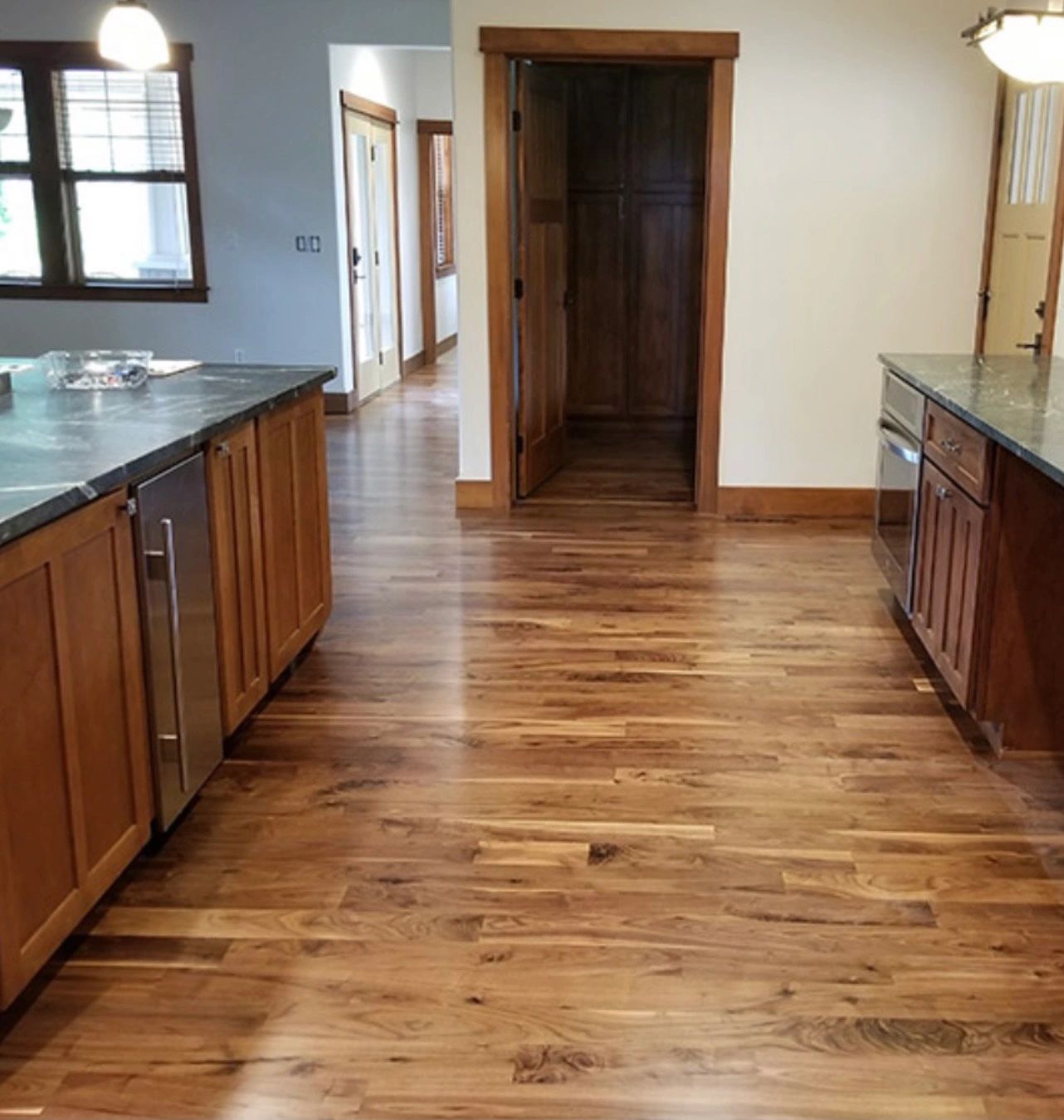 Hardwood Floor Refinished In Kitchen Area.