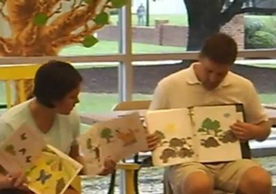 Dr. Tisha Duncan (Author) and Mr. Phil Holeman (Illustrator) during a book reading with children.