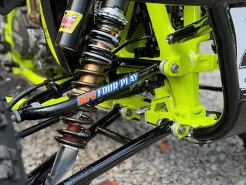 Close-up of motorcycle suspension system.