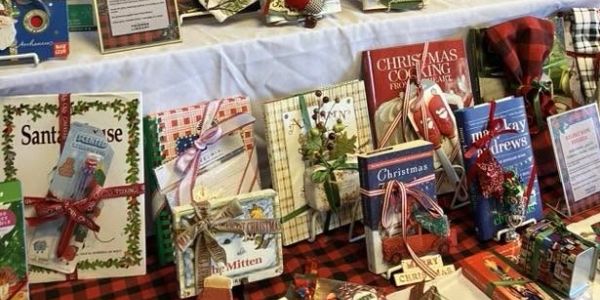 Holiday-themed books and decorations on display.