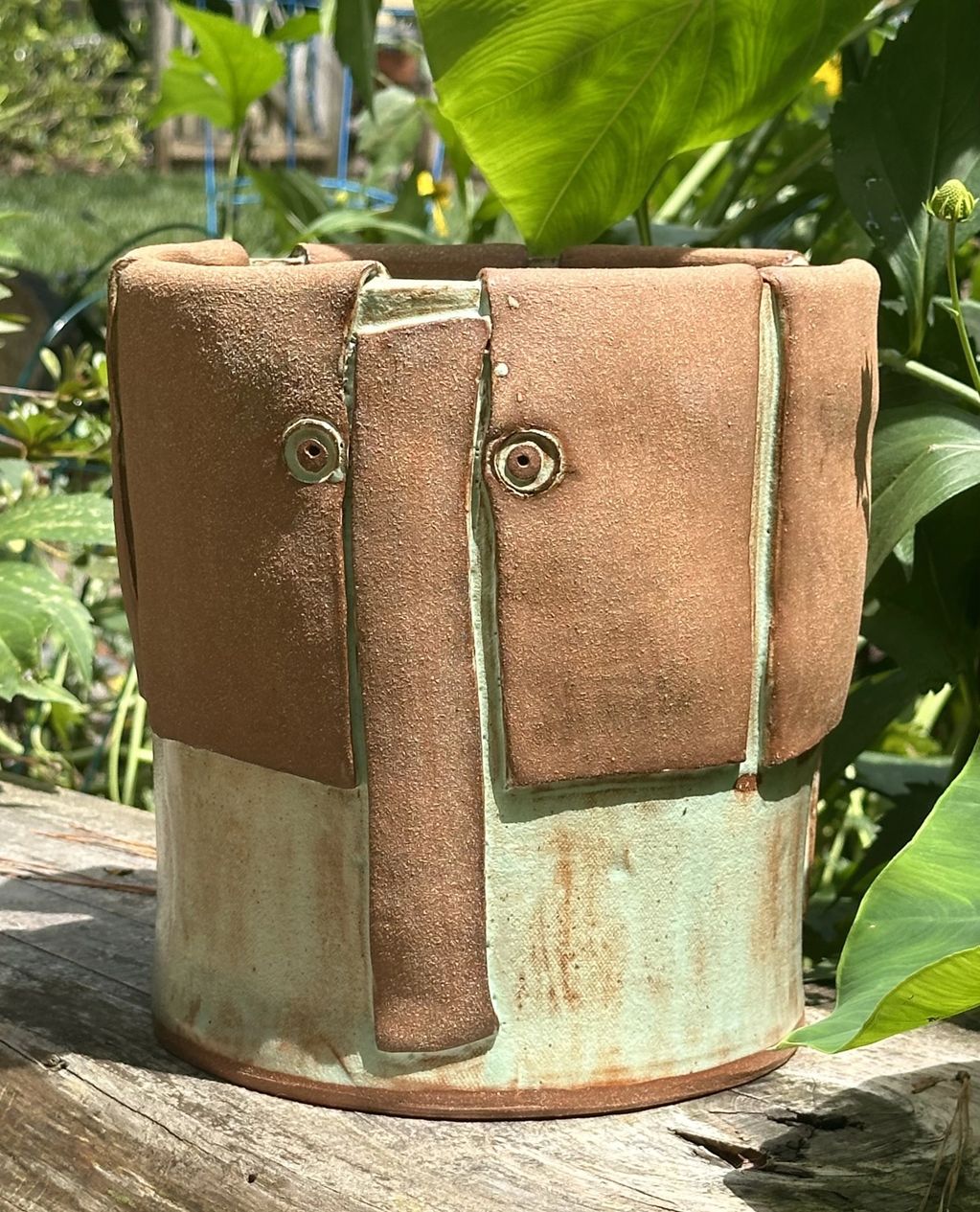 I AM ELEPHANT: Large hand-built crock with heavy elephant design relief. Bare red stone design over 
