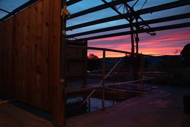 Wildhorse Hot Springs concrete soak at sunset. Pink sky, mineral water, healing, Montanta. 