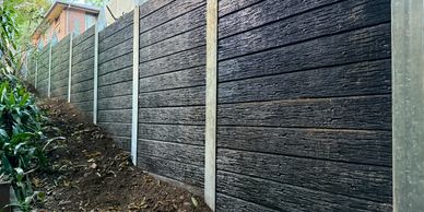 Dark Wood Concrete Sleeper Retaining Wall
