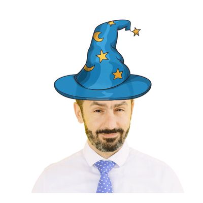 Man wearing a cartoon wizard hat with stars and moons.