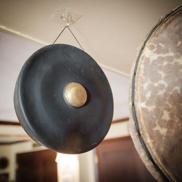 Bossed Gong — struck with soft mallets, producing focused tones for grounding and clarity.