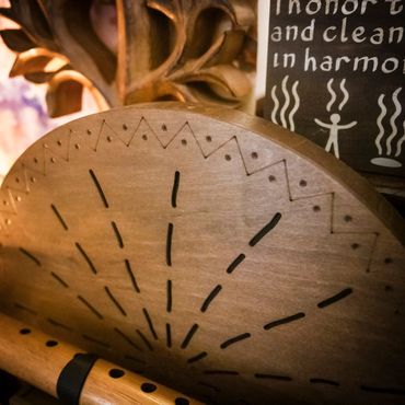 Wooden Ocean Drum — gently tilted or shaken, creating rolling wave sounds for calm and flow.