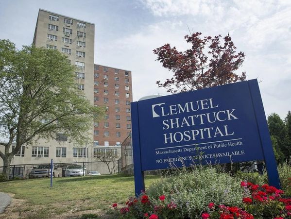 Lemuel Shattuck Hospital sign in front of a multi-story medical building.