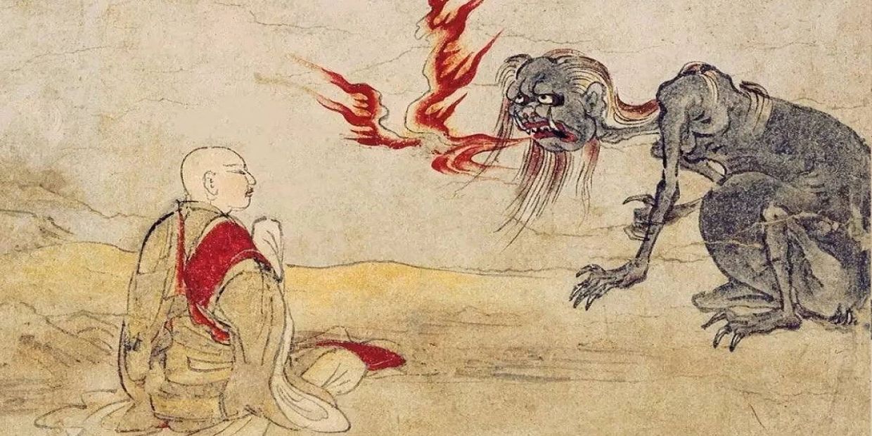 A monk confronts a fiery demon in an ancient Japanese painting.
