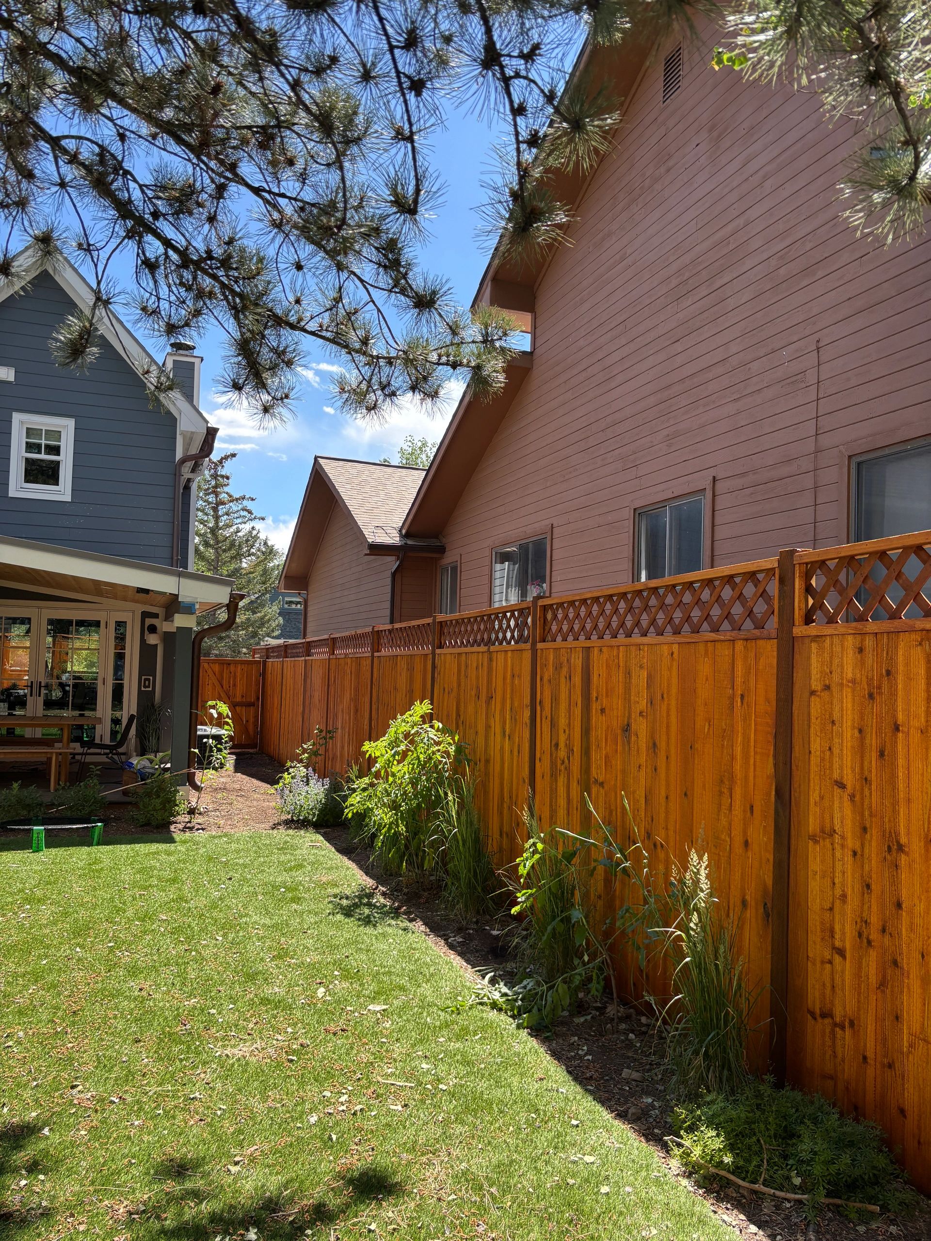 cedar lattice fence stained