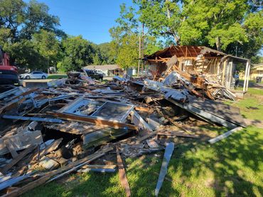 Debris from a demolished structure and construction waste.
