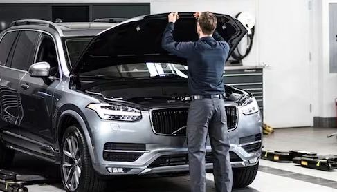 Our professional mechanic inspecting a Volvo XC90.