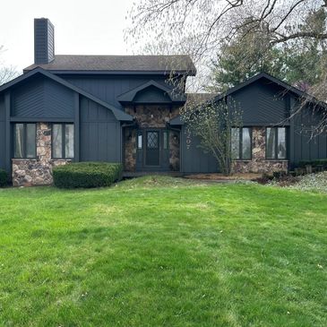 Exterior house painted in Sherwin Williams 7069 Iron Ore