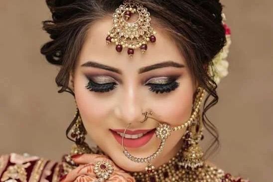 Close-up of a bride with traditional jewelry and makeup.