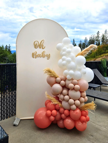 Elegant balloon arrangement with "Oh Baby" sign for a baby shower.