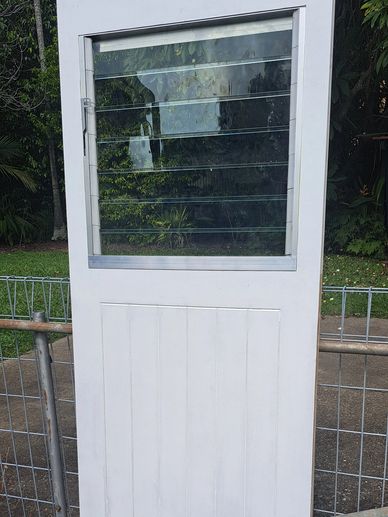 This door was built using a unique cross laminated timber door blank. Breezeway glass louver mechani