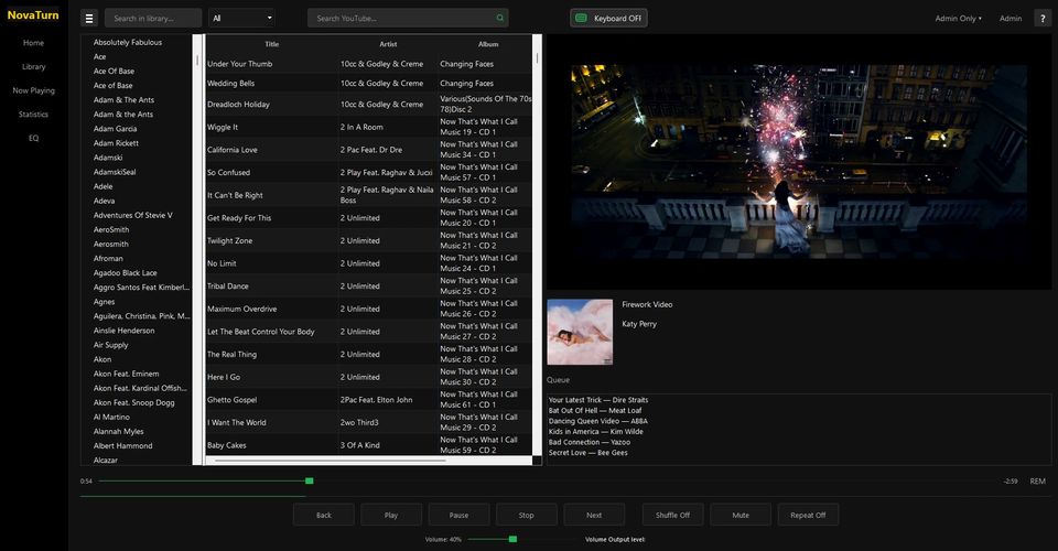 Screenshot of a music player app with playlist and video of fireworks.