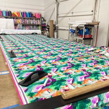 cutting fabrics and sewing clothing in USA