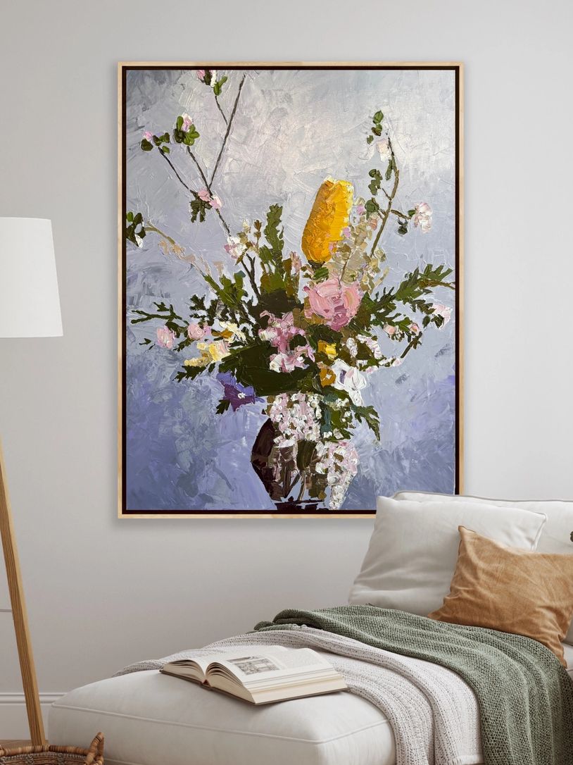 Impressionist floral painting with vibrant colors in a cozy living space.