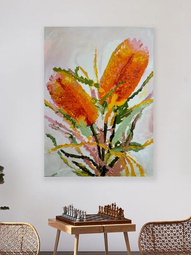 Abstract painting of orange flowers on a wall above a chess table.