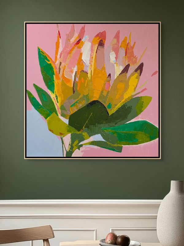 Colorful abstract flower painting with green leaves on pink background.