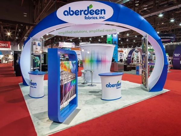 Custom 20 x 20 trade show booth with tension fabrics. 