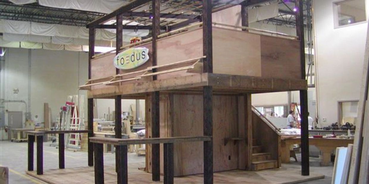 Two story custom trade show booth from Fast Exhibits 