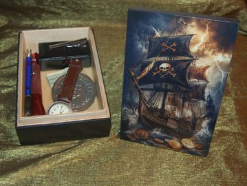Pirate-themed gift set with watch and compass.