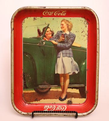Vintage Coca-Cola tray with two women and a car.