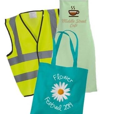 Printed samples of safety vest, apron & shopper bag