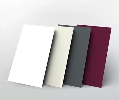 Sample boards shows lacquer finishes: white, off-white, deep charcoal, and burgundy.