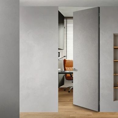 Modern minimalist concealed door in gray finish, seamless design for contemporary interiors.