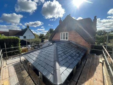 New slate roof by Gergory Adams Roofing
