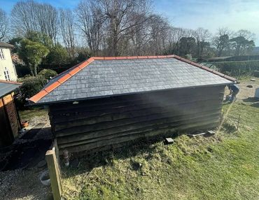 New tiled Roof by Gregory Adams Roofing.