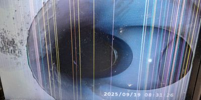 Drain survey by CCTV in progress to identify defect causing blockages to a ground floor toilet.