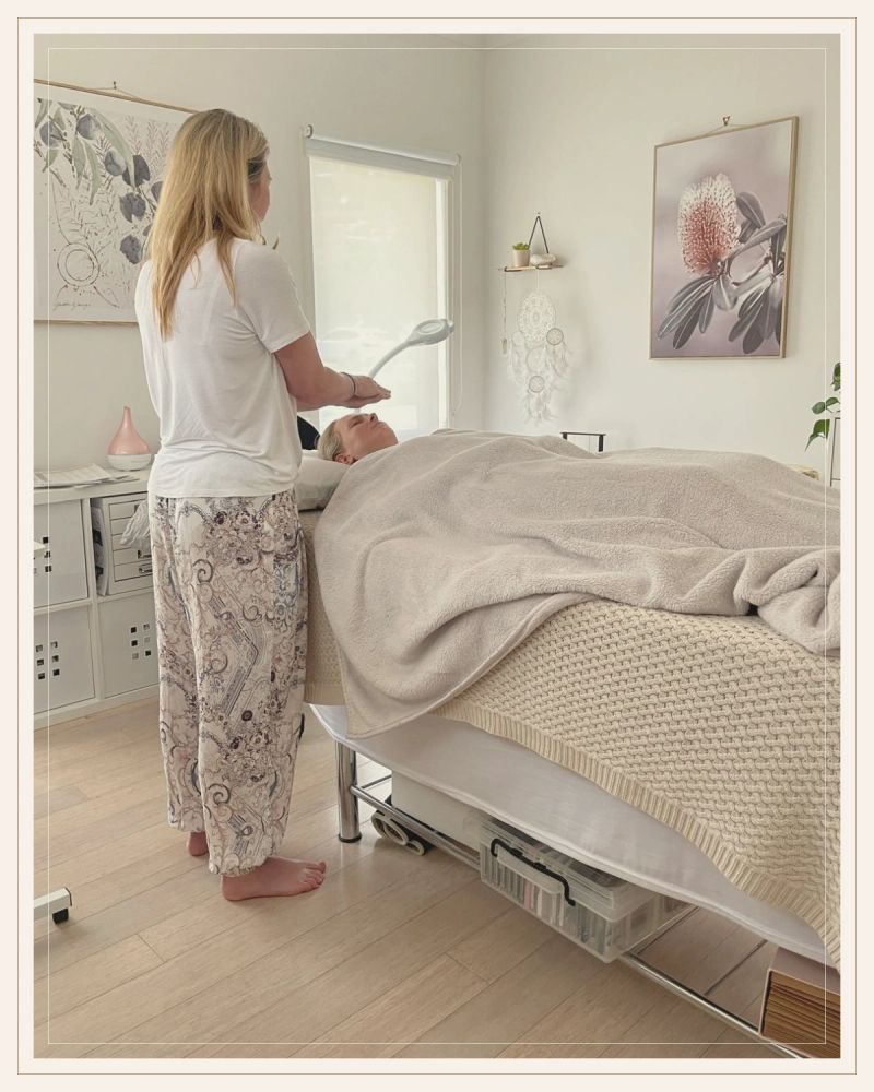Kari Marsden performing Reiki on a client at Higher Healing in Altona North, Melbourne.
