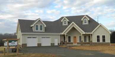 Custom home designed and built with energy efficiency, SIPs, low maintenance, and Solar 