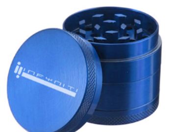 Blue metal herb grinder with lid.