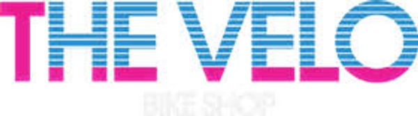 Logo with 'THE VELO' in blue and pink text.