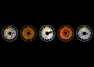 Five colorful circular designs on a black background.