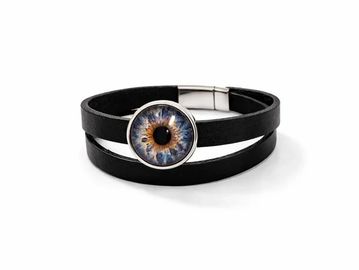 Black leather bracelet with an eye design centerpiece.