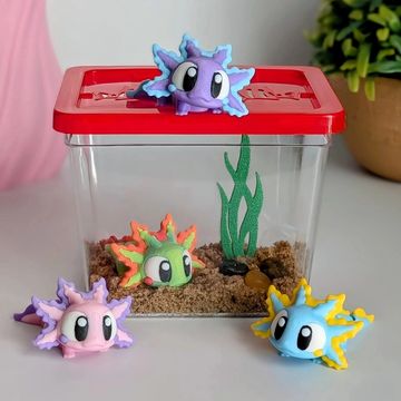 3D printed axolotl desk pet with colorful aquatic habitat and articulated interactive details.